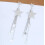 Brincos boho-chic com pingente de estrela em metal para mulheres 4