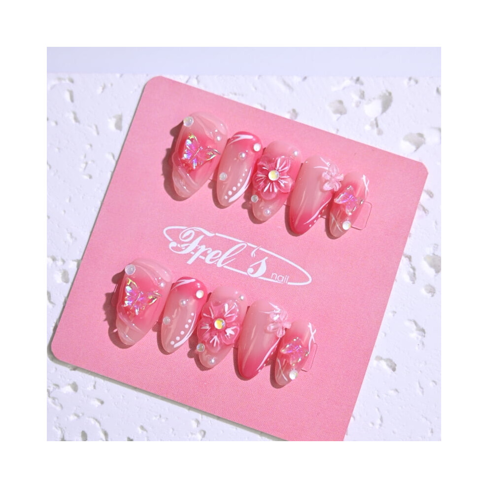 Frely's almond press-on nails with aurora butterfly