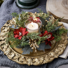 Christmas candle ring wreath with pine and pinecones