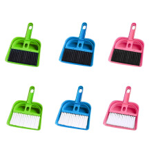 Small plastic dustpan and brush set for desk and car