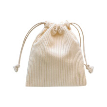 Corduroy storage bag with drawstring strap and pocket,