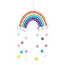 Rainbow wall hanging decor with pastel pom poms