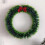 Christmas Wreath Plastic Green 25cm with Red Bow 7