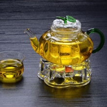 Clear glass heart-shaped teapot warmer with candle holder