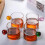 Glass tea cup with handle, mini pitcher, creamer, and 5