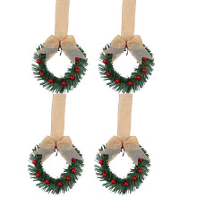 Christmas kitchen cabinet wreath with plaid bow