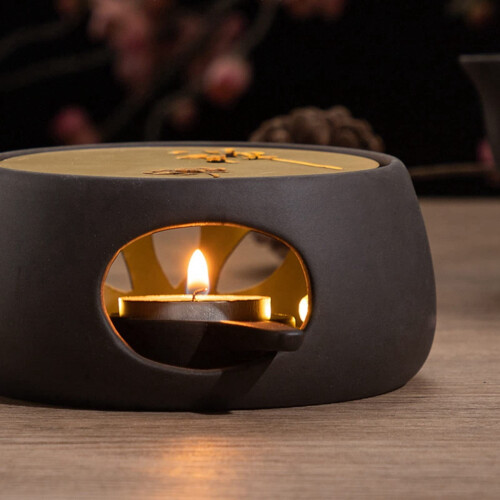 Ceramic teapot warmer base with hollow candle heating design 2