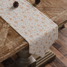 Chemin de table décoratif pour les fêtes, imprimé flocons de neige dorés, pour une touche d'élégance à vos repas de Noël. Tissu ultra-doux,