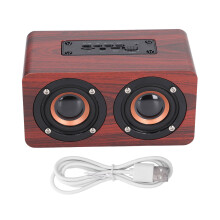 Profitez d'un son surround grâce à cette enceinte en bois au design rétro qui apporte une touche vintage à votre décoration intérieure.