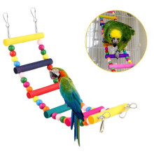 Accessories for bird cages: colored perch, platform, ladder, and hammock for small birds and parrots. Label