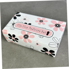 Set professionale per manicure e pedicure, ciabatte a fiore, tagliaunghie e custodia.