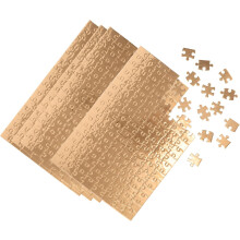 4 jeux de puzzles vierges dorés, chacun idéal pour des projets artistiques DIY et la sublimation.
