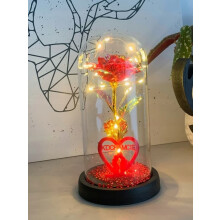 Evig rose i glas med LED-lys i en sort æske