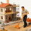 Winziges Miniaturfiguren-Set „Construction-Mann schiebt Einrad 8