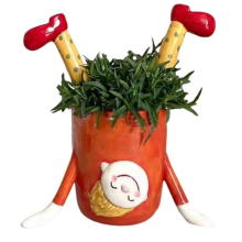 Blumentopf mit umgedrehtem Mädchenmotiv, für drinnen und draußen, orange