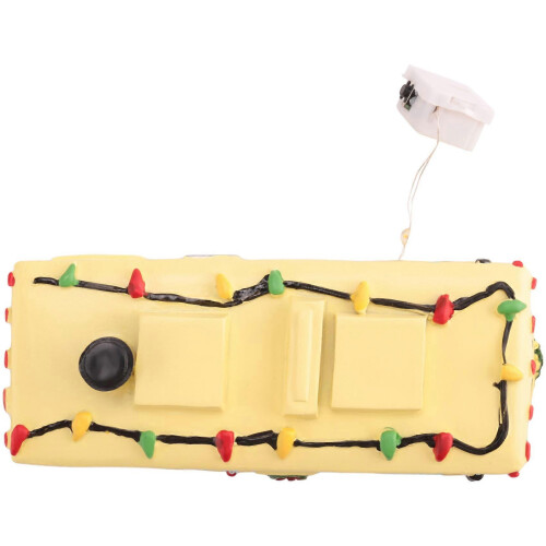Opplyste julelandsbyhus sett festlig feriedekor 2