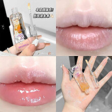 Cappuvini Smile Shine Lip Oil, a tinted lip oil that moisturizes and softens lips. Affordable lip oil.