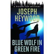 Blue Wolf In Green Fire A Woods Cop Mystery by Joseph Heywood Paperbac