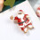 2St Metalen Kerstbroche Dames En 3