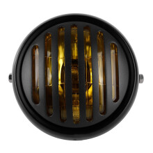 Ronde motorfietskoplamp met beschermrooster, koplamp met hoge lichtopbrengst voor vintage en custom motoren, robuuste en schokbestendige constructie.