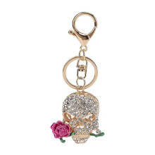 Porte-clés tête de mort, crâne en forme de rose de la mort incrusté de diamants, accessoire pour clé de voiture et pendentif pour sac femme