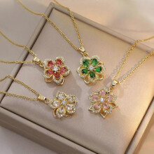 Draaiende ringketting met ingelegde veelkleurige zirkonia-bloemen, roestvrijstalen sieraden