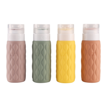 Juego de 4 botellas de viaje de silicona de 100 ml para artículos de aseo, a prueba de fugas y exprimibles.