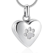 Sieraden voor de crematie van huisdieren: hanger met pootafdruk, hartvormige urn, ketting met gedenksieraad voor de as van uw huis