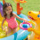 Parque aquático infantil Dinoland com escorregador e fonte 13