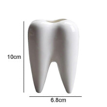 Vaso in ceramica a forma di dente creativo per soggiorno, ideale per composizioni floreali e decorazioni.