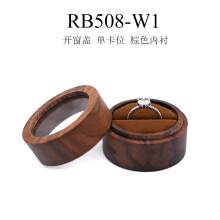 Portagioie rotondo da donna con lavorazione traforata, anelli e altri accessori, in legno massello di noce nero, modello RB508-W1.