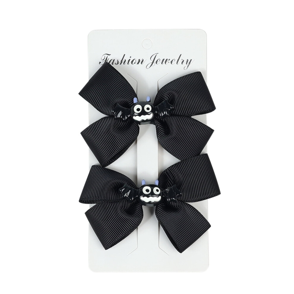 Halloween hair bow with pumpkin bat spider ghost design