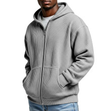 Moletom masculino com capuz, zíper frontal e textura waffle, com bolso canguru.
