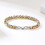 Bracciale in titanio bicolore argento e oro, 21 cm, elegante accessorio da donna. 4