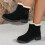 Botas femininas com laço, pretas, em nylon e elastano, cano médio e salto baixo. 2