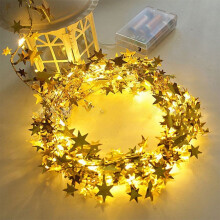 Cordão de luzes LED em formato de estrela, flexível e dourado, alimentado por bateria.