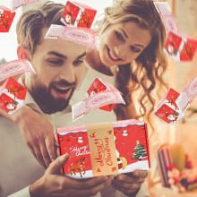 Coffret cadeau surprise de Noël avec Père Noël rouge et rennes