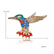 Hummingbird brooch with crystal and pearl accents red