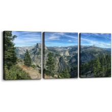 Tableau moderne sur toile murale, représentant des traînées de condensation au-dessus d'une montagne