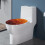 Ovaler Toilettendeckelbezug mit Ahornblättern als Herbstdekoration 3
