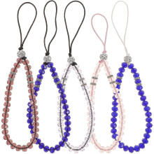 Lot de 5 accessoires de voyage pour femme : dragonnes, porte-clés et breloques pour téléphone portable.
