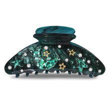 Six pinces à cheveux ornées de motifs d'animaux marins, notamment des étoiles de mer, des coquillages et des perles.