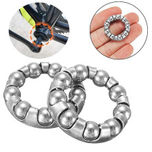 Bicycle wheel bearing retainer for front and rear axle