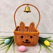 Easter bunny rattan basket with pink bow and 3 eggs