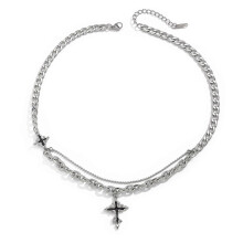 Vintage parelketting met sterrenmotief en stevige legering kruisjes als hanger, een trendy sieraad voor vrouwen.