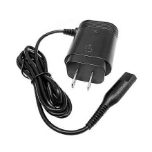 Câble de chargeur à 2 broches d'origine pour rasoir Braun Series 3, 5, 7 et 9, avec prise installée.