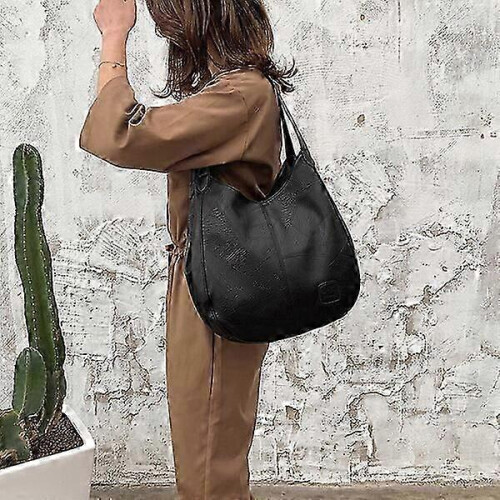 Borsa da donna, dimensioni approssimative 26x10x31 cm, capiente e portatile. 1