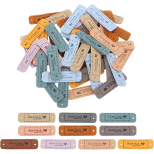 100 Pcs Handmade Leather Labels, PU Leather Handmade Tags Button with Hole Embossed Tag for Embellishment DIY Sewing Crafts, 55x15mm, 10 Colors