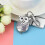 Muodikas taskuavaimenperä pöllökelloklipillä 3