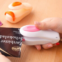 Mini scelleuse portable haute température, plastifieuse à piles pour emballage de snacks, idéale pour la maison et la cuisine.